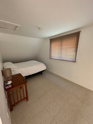 Double bed opposite side of the queen bed in the loft.